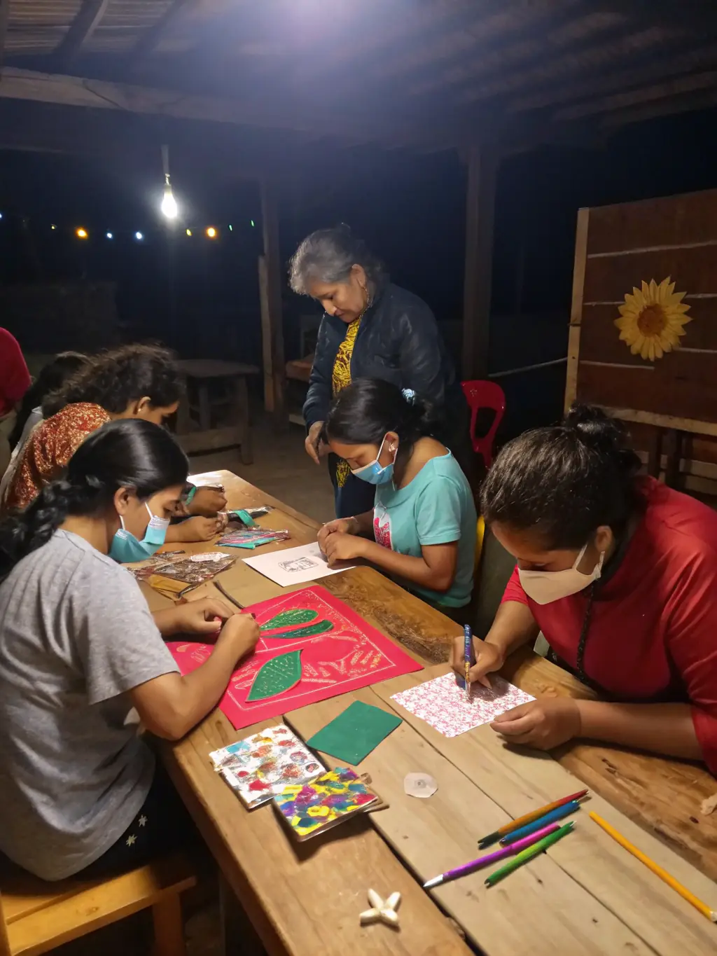 A photo of a workshop where participants are learning traditional crafts, such as weaving or pottery, related to Crocq's cultural heritage.